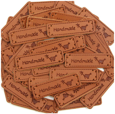 Бирка нашивка кожаная Hand Made птичка. Горизонтальная. Коричневая (1 шт) фото 1 — CRYSTAL SHOP